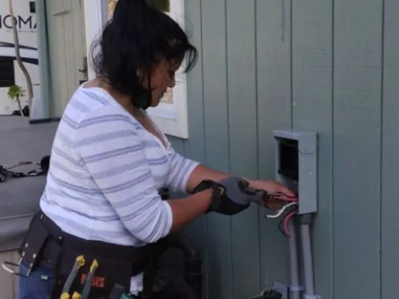 Licensed electrician wiring an exterior subpanel in Wildomar